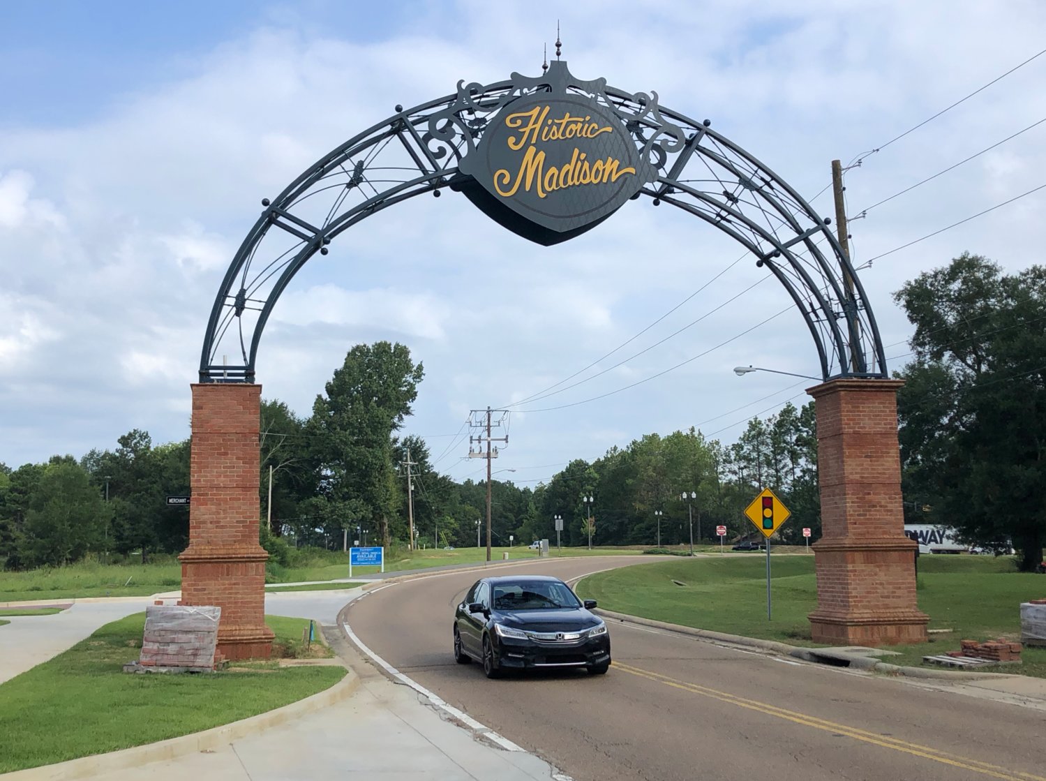 A brick archway was erected at the Village of Madison development.